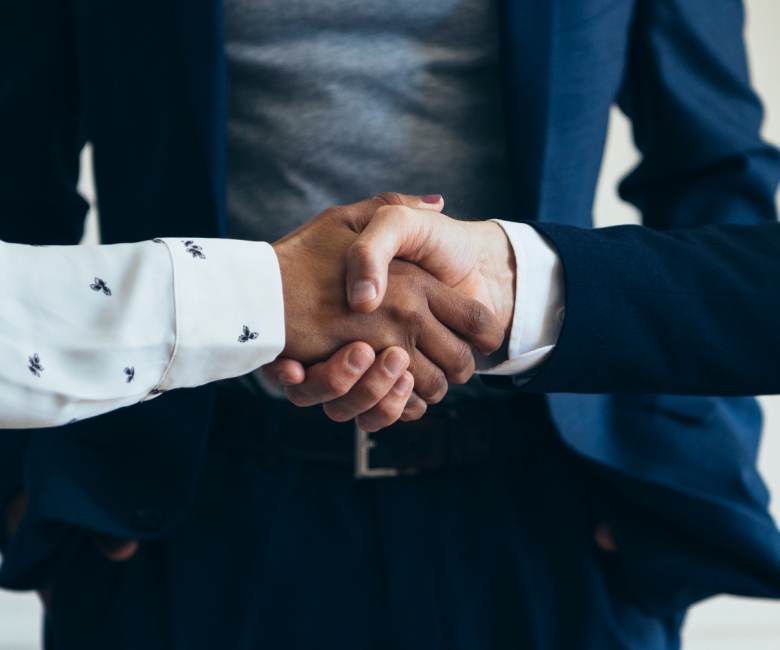 happy-diverse-business-people-making-deal (1)